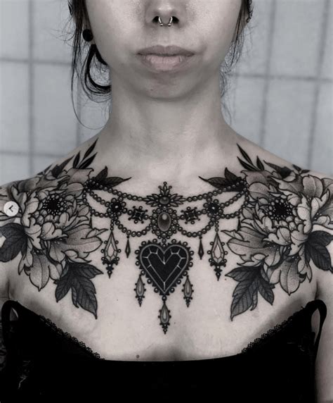 small upper chest tattoo female|Top 10 small chest tattoo female upper ideas and inspiration